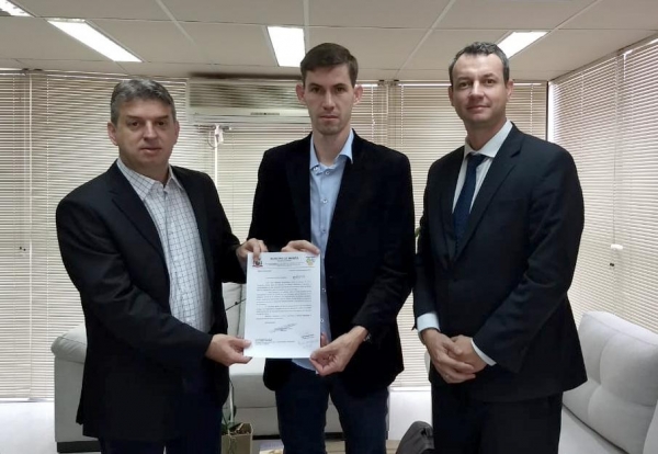 Audiência na SESP, com o secretário Julio Cezar dos Reis e Leandro Nesello.. (Foto: Assessoria)